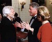 Gerry Mulligan with President Clinton and Hillary Rodham Clinton at a White House reception for the 18th annual Kennedy Center Honors, December 1995. Mulligan was on the Artists' Committee for the 1995 Kennedy Center Honors.