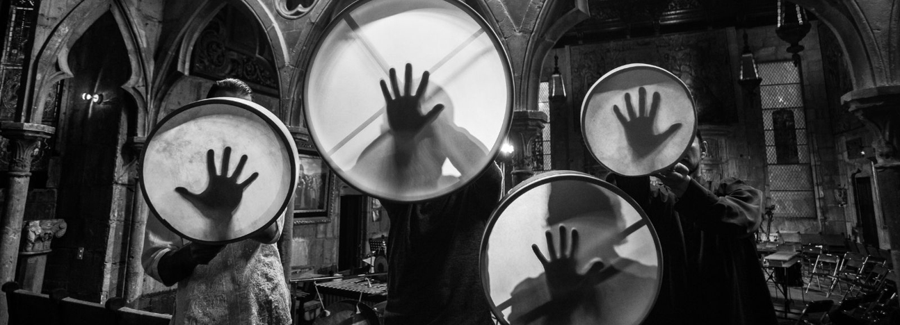 musicians holding drums