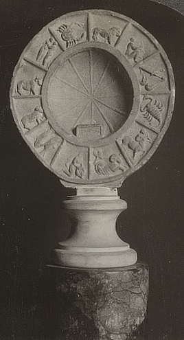 Pair of photos shows a round stone with the Zodiac signs carved around the rim.
