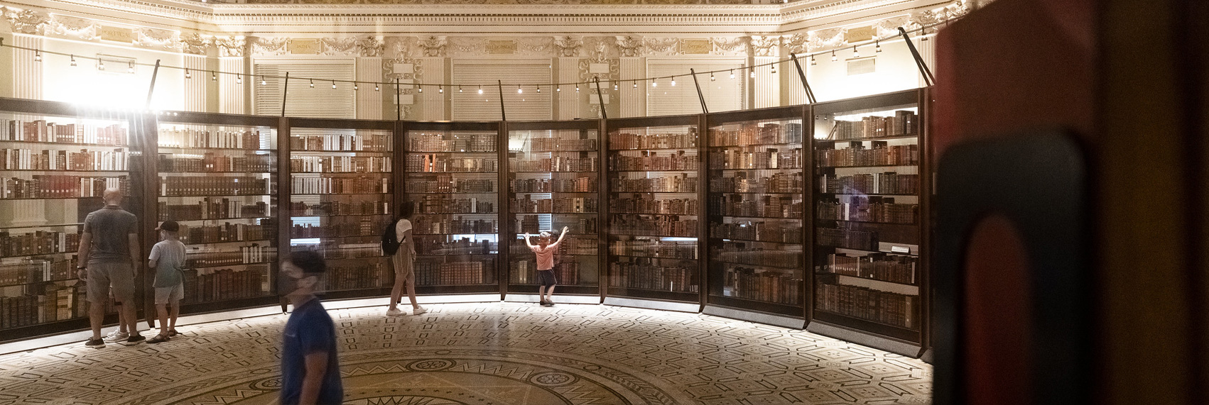 Patrons viewing the display of Thomas Jefferson's Library