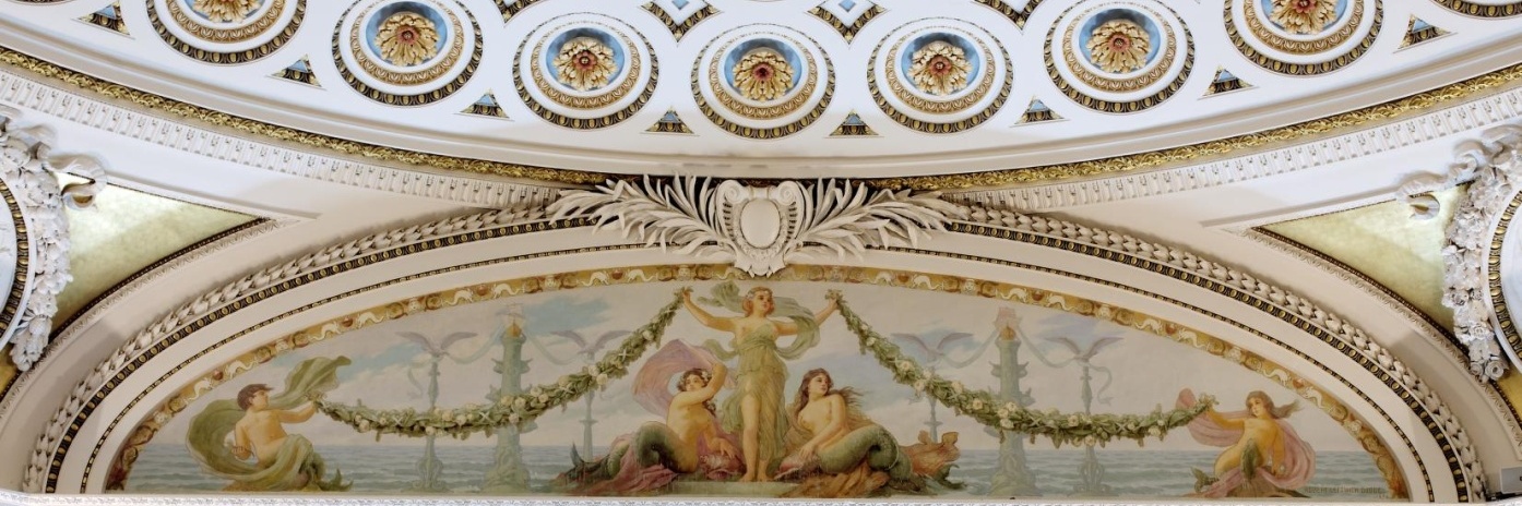 A section of the upper wall of a room in the Jefferson Building with a man and two women representing fire of the four elements
